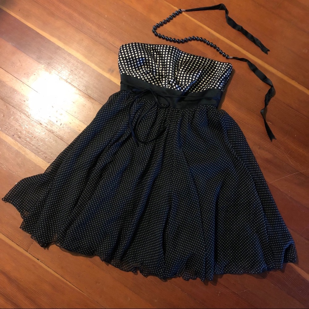 Black & tan polka dot strapless dress. Size small.